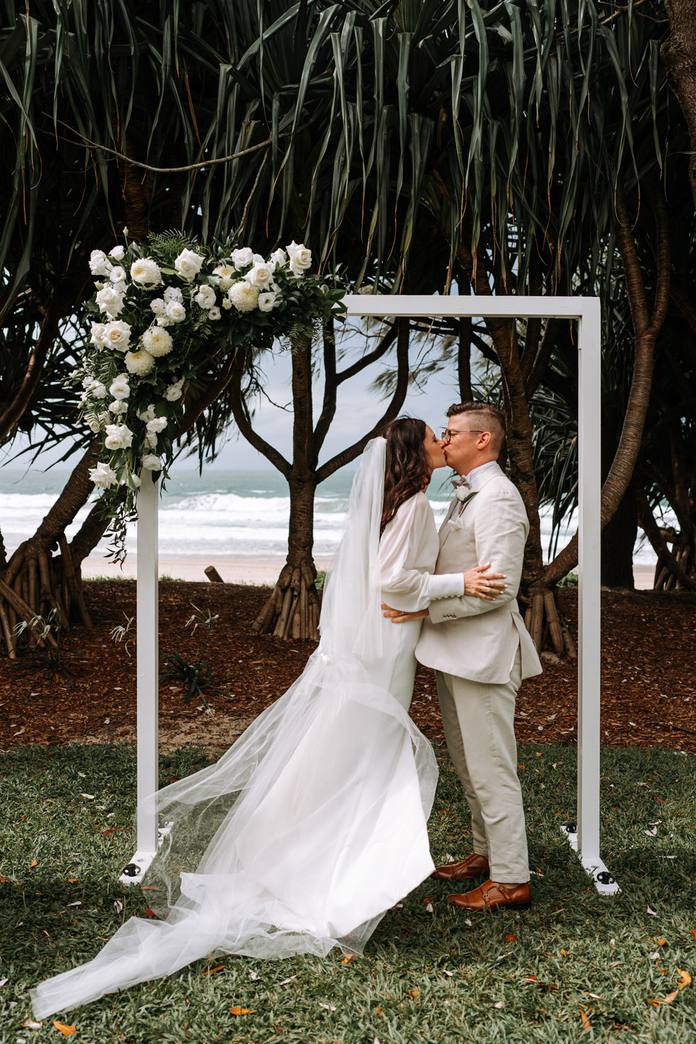 Noosa wedding photography of bride and grooms at Ricky's Restaurant by Noosa photographer