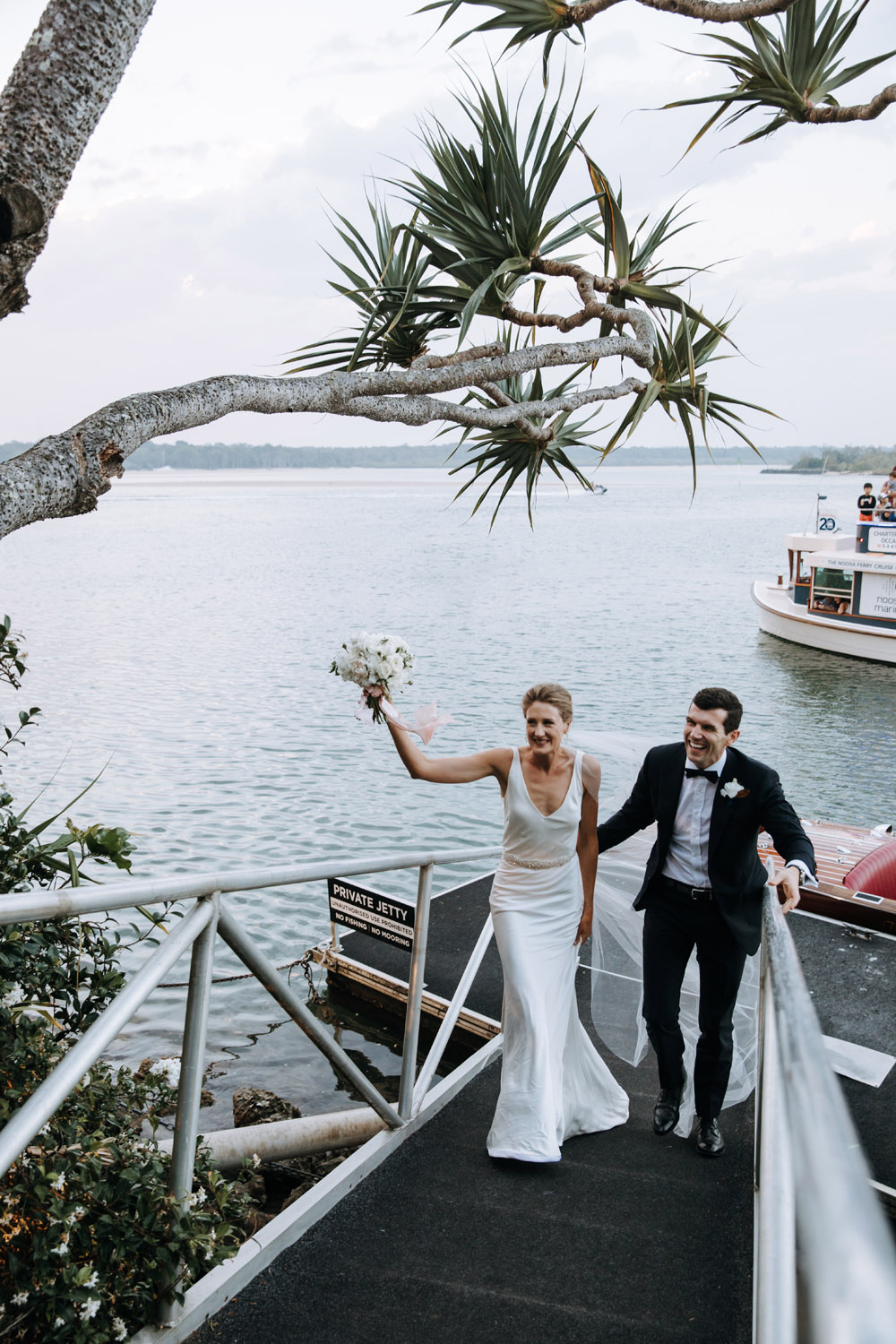 Noosa wedding photography of bride and grooms at Ricky's Restaurant by Noosa photographer