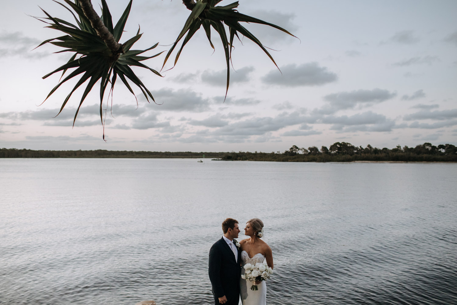 Noosa wedding photography of bride and grooms at Ricky's Restaurant by Noosa photographer